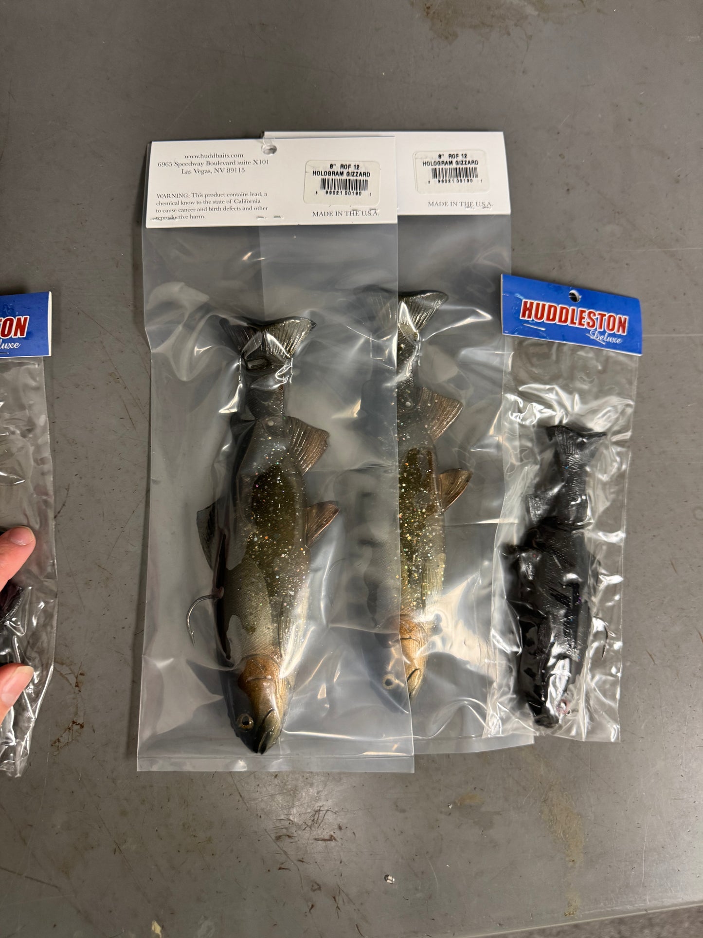 2 8” ROF 12 hologram gizzard shad and 1 6” night stalker